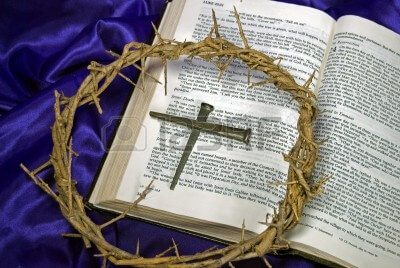 Crown of thorns and spikes on Holy Bible. Stock Photo - 8935412